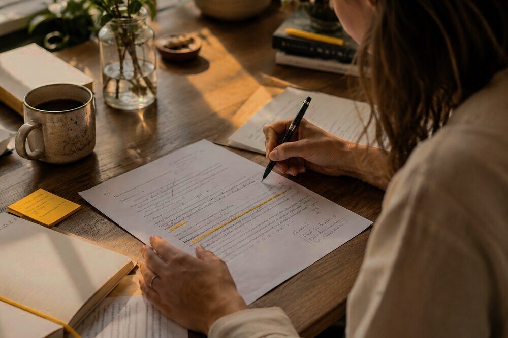 A person checking documents to protect confidentiality