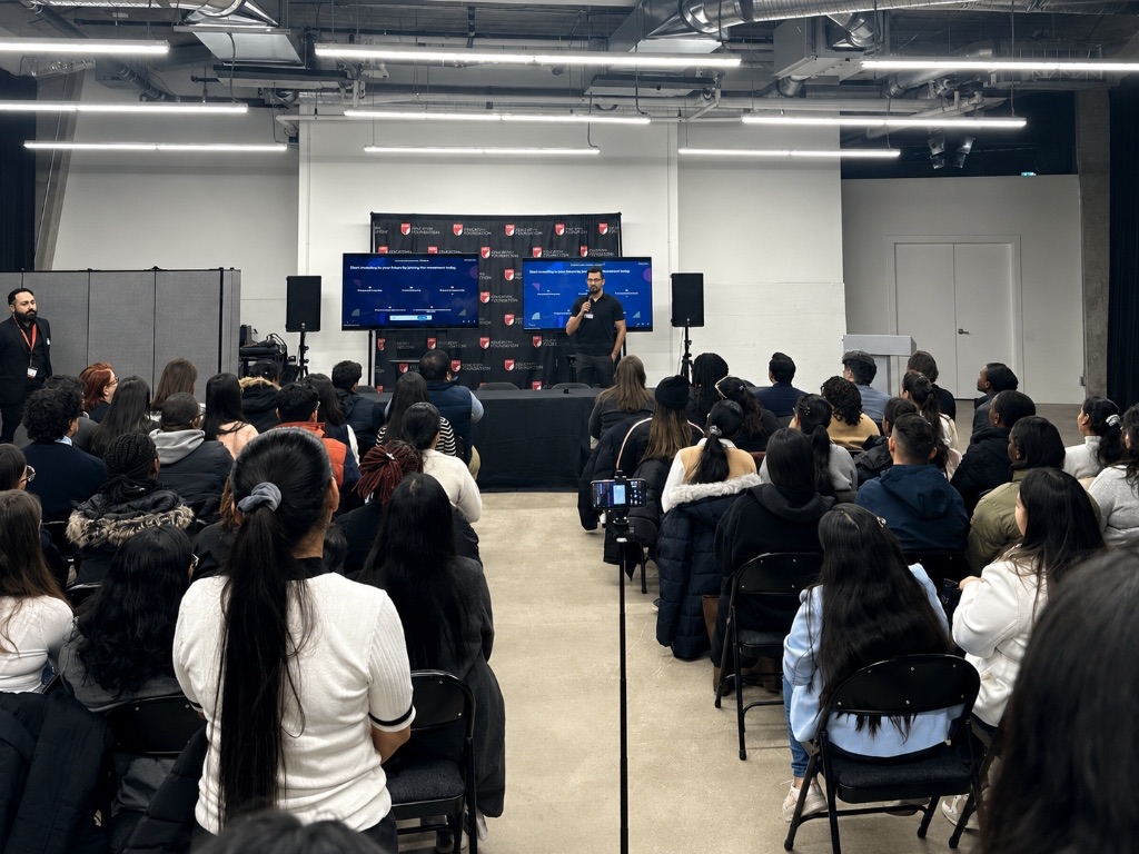 An audience taking part in a practical AI session